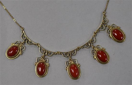 A 20th century Italian 12ct gold and oval cabochon coral set drop fringe necklace, approx. 44cm.